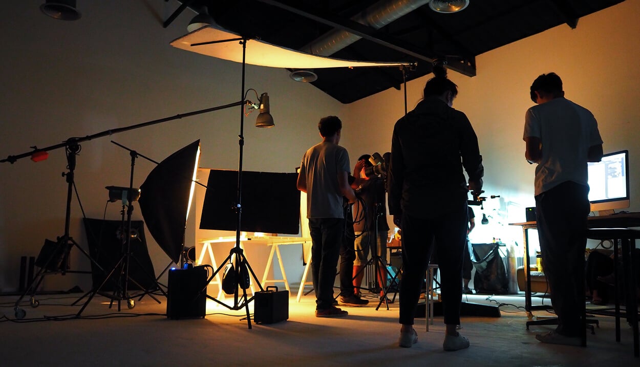 Silhouetted Production Team Shooting Video